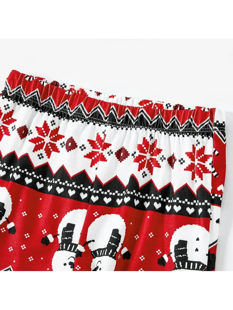 Elastic waistband and cuff detail on Let It Snow kids Christmas pajama pants for comfortable fit.
