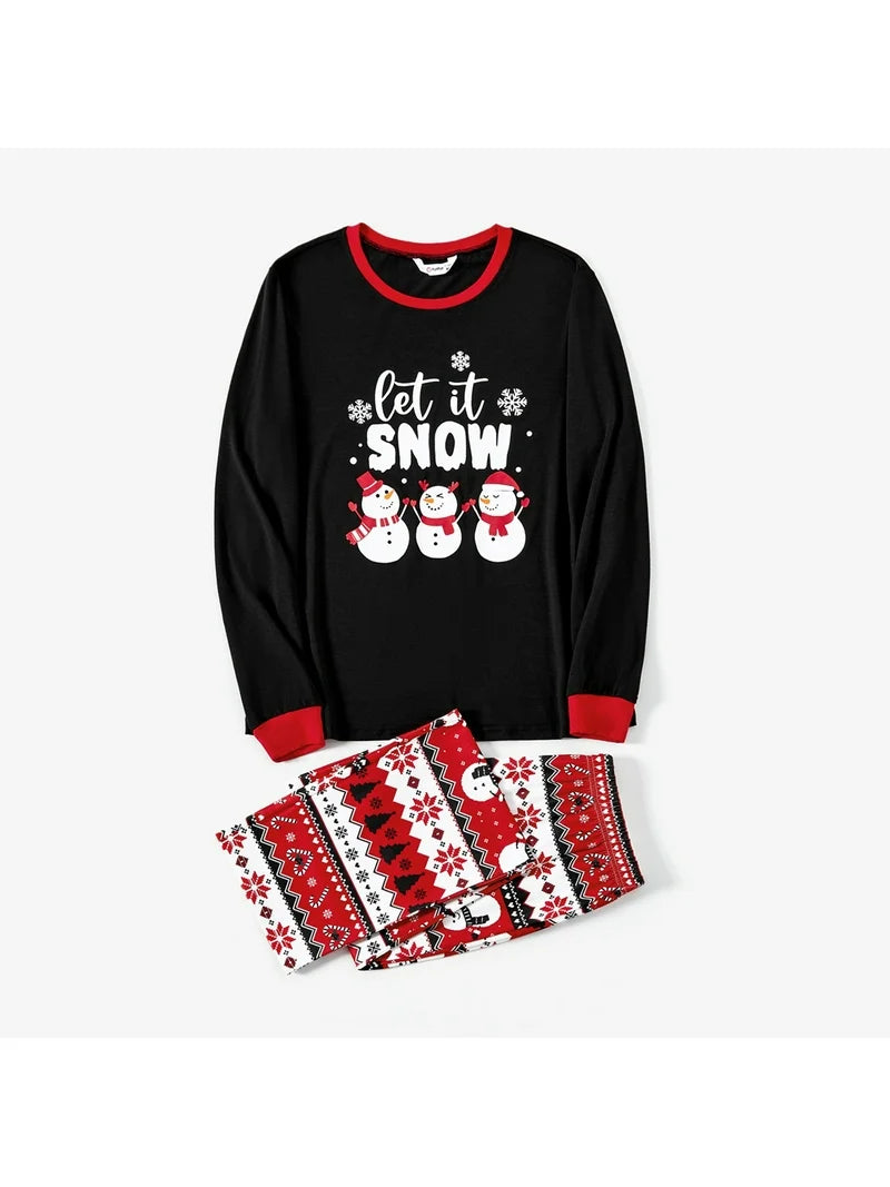 Folded Let It Snow kids Christmas pajama set with long sleeve top and snowflake print pants.